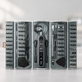 Open four-panel precision screwdriver kit displaying electric screwdriver handle, 144 CR-V bits, sockets, tweezers, and prying tools.