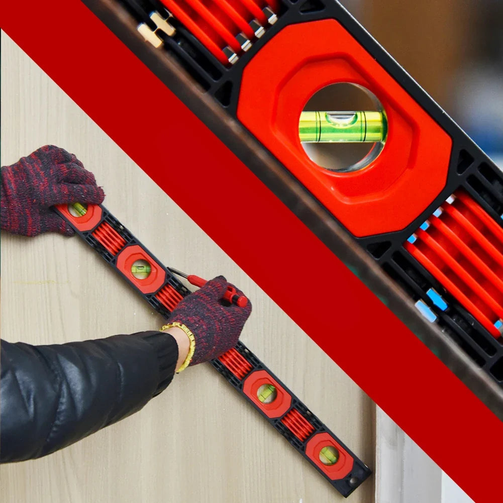 Carpenter using the fully extended 600 mm multi-function level to mark a straight horizontal line on a wooden board.