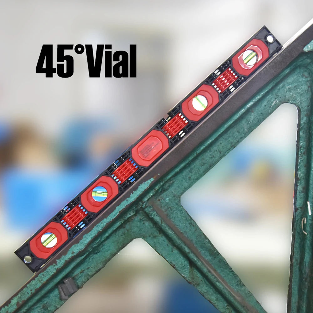 Close-up of the 45-degree angle bubble vial on the extended folding level placed against an inclined metal beam.